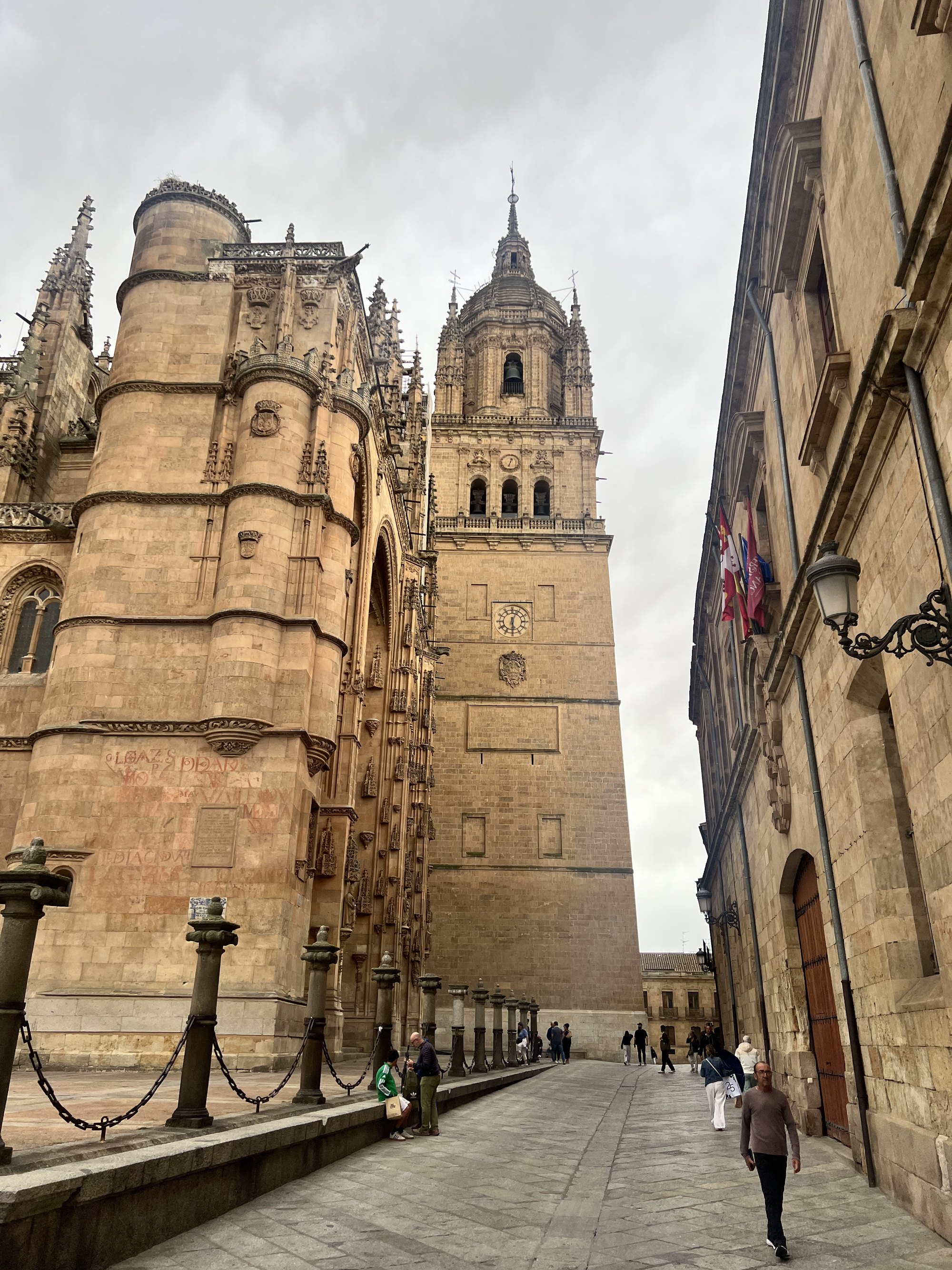 New Cathedral close-up. Golden sandstone, overcast, and a few people who actually packed a jacket.